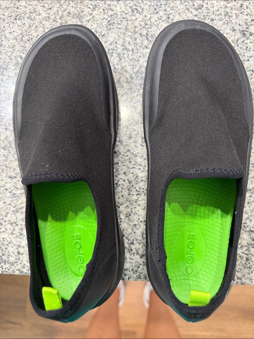 OOFOS Women’s OOmg eezee Black Slip-On Recovery Shoes with Bright Green Footbed